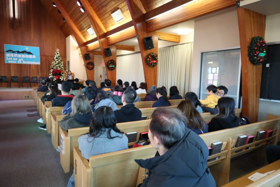 Students and parents celebrating Christmas together at the Chinese School
