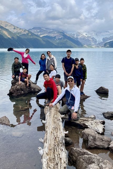 Enjoying the view at a glacier-fed alpine lake
