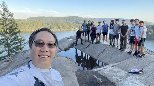 A selfie stop along the trail with a stunning coastal view