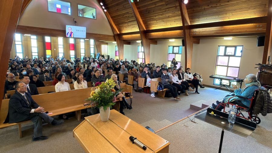 Congregation listening at an evangelistic meeting