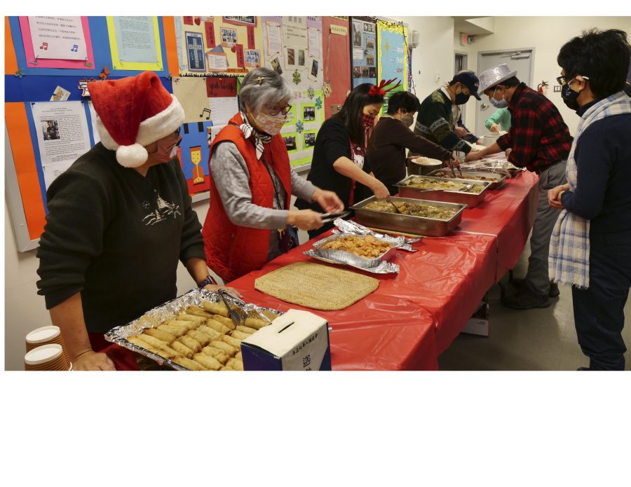 Faith Fellowship members serving lunch for Caleb Fellowship